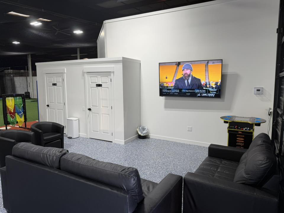 Player lounge with TV and arcade